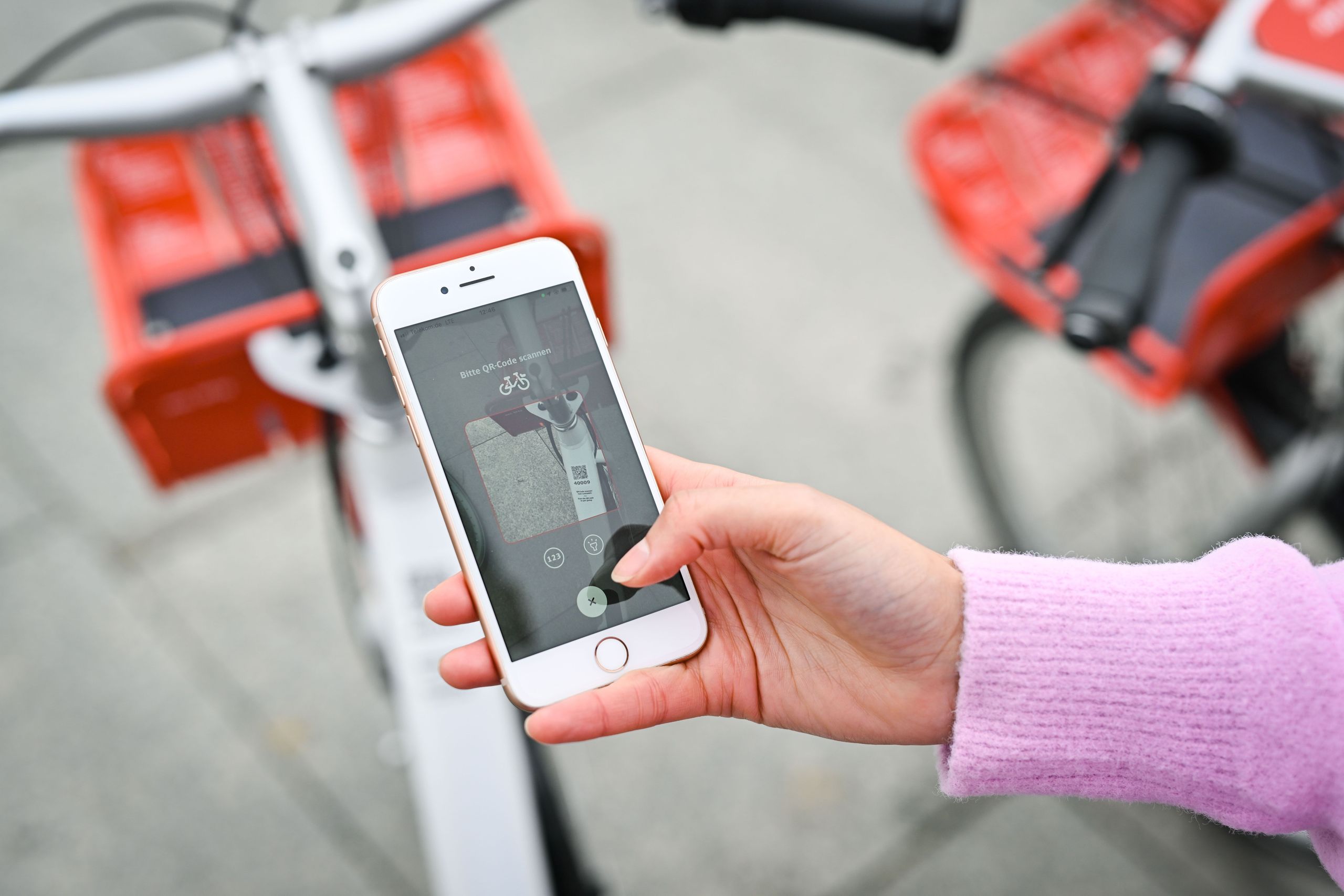 Woman scans QR code via app